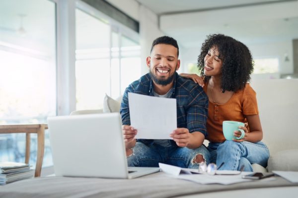 Happy Couple Looking Over Finances in Hanover, MD